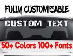 Use clear, white or perforated car window stickers to draw attention to your business. Custom Windshield Decals Word And Number Car Truck Window Etsy