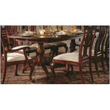 Dining set features a warm cherry finish, ribbed trim w/stainless steel edges and capped feet, tapered legs, bowed ends, and includes 6 chairs. Discount Cherry Mahogany Dining Tables On Sale