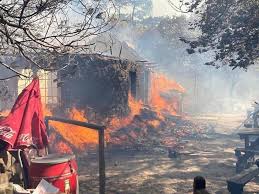 Firefighters try to extinguish a fire in the jagger library, at the university of cape town on april 18. Qtcouwzk20u 5m