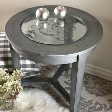 When distressing the tabletop go ahead and lightly sand the entire surface. Solid Wood And Glass Top Round Coffee Table Freshly Painted Silver Black Hand Painted Glass Silver Coffee Table Coffee Table Wood Round Side Table Black