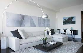 Pairing navy and white in a living room provides a nice neutral contrast, with a subtle nautical vibe. 15 Modern White And Gray Living Room Ideas Home Design Lover