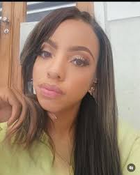 How old does she look? (This is my friend, we are trying to find her an age  appropriate hairstyle😂)