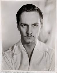 Photo of Fredric March used to promote the pre-code film The Royal Family  of Broadway, circa 1930. Later used as the cover photo (with additional  artwork) for the Grosset & Dunlap Photoplay
