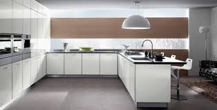 This kitchen features a darker color scheme, pairing glossy gray cabinets with a herringbone subway tile backsplash in a black stone shade. 15 Simple And Minimalist Kitchen Space Designs Home Design Lover