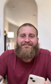 I really don't like that guys beard, if he cut it close to his face it  might be acceptable.