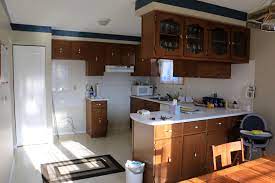 Elegant kitchen with espresso see through glass cabinets over white marble topped pass through. Kitchen Update On A Budget Album On Imgur