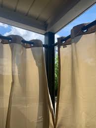 The coupler will sit in the center support rod, with the screws pointed towards the wall and won't really be visible. Outdoor Curtain Tension Rod Patio Or Balcony Outdoor Curtain Rods Outdoor Curtains Curtains