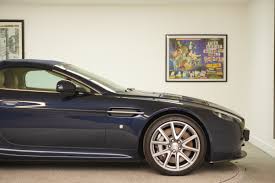 Image result for Midnight Blue 2011 Aston Martin