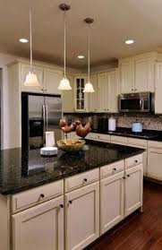 Brown kitchen cabinets with black countertops. 24 Ideas For Kitchen Ideas Cream Cabinets Black Countertops New Kitchen Cabinets Trendy Kitchen Backsplash Kitchen Cabinets