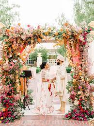 A Union Station Wedding Celebration Feathered Arrow Indian Wedding Flowers Outdoor Indian Wedding Indian Wedding Decorations