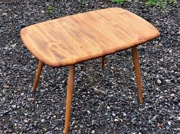 It's made from solid elm, with stunning grain patterns on the top. A Vintage Ercol 213 Compact Coffee Table