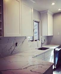 Check spelling or type a new query. Full Height Calacatta Laza Backsplashes And White Shaker Cabinetry Calacatta Laza White Shaker Quartz Backsplash
