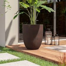 Now you can add colorful plants or green shrubs to the concrete planter, and place it anywhere in your. 5 Outdoor Planters You Ll Want To Put On Your Patio Right Now Better Homes Gardens