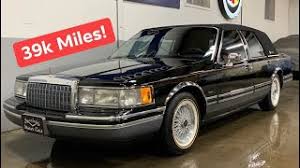 Image result for Black 1993 Town and Country