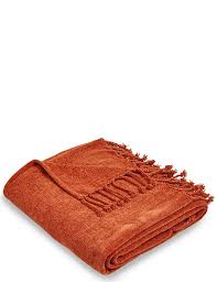 Fuzzy, fluffy chenille is the ultimate comfort fabric. Plain Chenille Throw M S