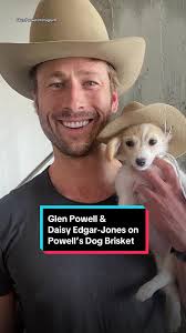 Dog in Raincoat Glen Powell