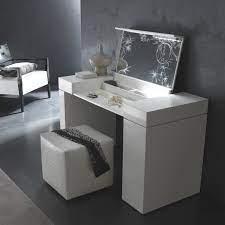 For a calm and stylish bedroom, why not choose a white dressing table? Amazing Bedroom Vanity Table And Chair Ideas Design Pics