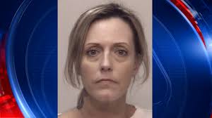 Woman accused of stealing donations to children's cancer charity