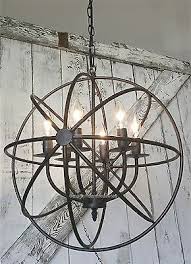 So we had to bring you this beautifully rustic caged chandelier! Industrial Round Chandelier Light Fixture Globe Metal Rustic Armillary Sphere Industrial Light Fixtures Vintage Industrial Lighting Rustic Industrial Lighting