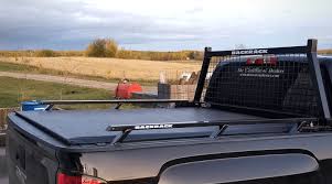 This retractable truck bed cover has a simple clamp on design. Pair A Backrack Truck Rack With Your Tonneau And Ramp Up Protection The Engine Block