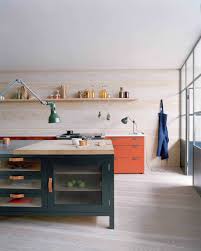 Burnt orange and salvaged wood give a charming rustic touch to a country kitchen decor with solid wood ceiling beams, wooden furniture and orange paint for dining furniture and kitchen cabinets, orange decor accessories and tableware in orange color can be used for modern kitchen design and. Burnt Orange Kitchen Ideas Photos Houzz