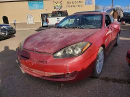 Image result for Electric Red 2005 Tiburon
