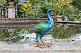 Bring A Tropical Summer To Your Garden All Year Round With This Fabulous Vibrant Peacock Garden Ornament Garden Ornaments Vibrant Animal Ornament