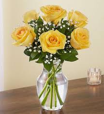 Yellow and white wedding bouquet with yellow bouquet with yellow roses that has an autumn sort of feel to it. Love S Embrace Yellow Roses 5th Ave Floral Co