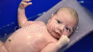 A baby cries after bath time when they are too tired and ready to sleep. Newborn Baby Crying Stock Video Video Of Frustration 46658301