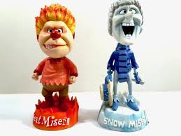 He lives in a volcano and controls the hot weather around the world. The Year Without A Santa Claus Heat Miser And Snow Miser Bobble Heads Retro Solstice