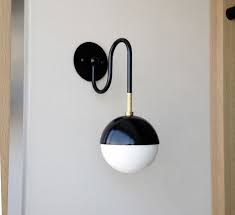 We did not find results for: High Low The Black And White Globe Light Remodelista Sconces Sconce Lighting Interior Lighting
