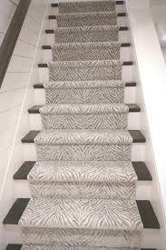 This is a stair runner and area rug made from a larger piece of broadloom carpet with was cut and bound down to a custom size for this customer. Animal Patterned Stair Runner Dresses Up A Boxed Stairwell Stairrunner Carpetrunner Rugrunner Ani Patterned Stair Carpet Stair Runner Carpet Carpet Stairs