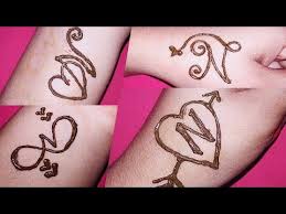 Unique v letter tattoos | beautiful v letter mehndi tattoo | latest v alphabet . Heart V And S Letter Tattoo Designs