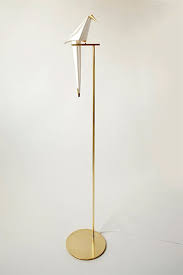 a gorgeous bird shaped lamp that s created out of paper lamp design lighting design