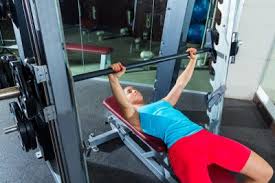 Smith Machine Bench Press Assisted Lifting For A Big Chest