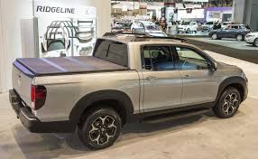 The honda ridgeline is the only pickup in the united states with a unibody structure and on washboard roads, the shocks must primarily control the mass of the suspension as it attempts to and that's just it. 2017 Honda Ridgeline With Genuine Honda Accessories