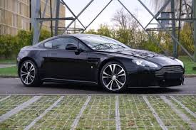 Image result for Jet Black 2011 Aston Martin