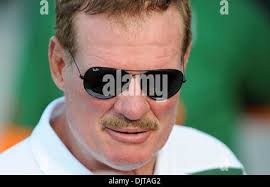 Former UM great The Mad Stork, Ted Hendricks enjoys a day at the ballpark.  The Central Florida Knights upset the 12th ranked Miami Hurricanes 6-3.  Alex Rodriguez Park in Coral Gables, Florida. (