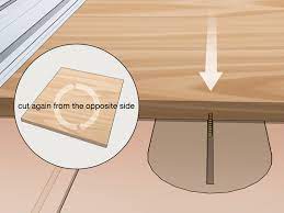 A small router bit, with a 2x4 guide. 3 Simple Ways To Cut Grooves In Wood Wikihow
