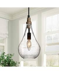 The hints of bronze and ribbed glass add visual interest, day or night. Remarkable Deals On Ksana Farmhouse Wood And Glass Pendant Lighting For Kitchen Island Bedroom Dining Room Entryway Sink Breakfast Nook