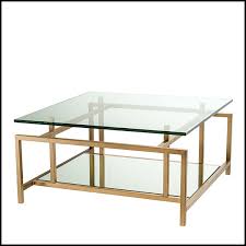I'm now confused on the finish. Coffee Table In Stainless Steel In Brushed Brass Finish With Clear Glass And Mirror Glass 24 Superia Brass Pacific Compagnie