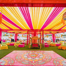 Mehndi Decor With Vibrant Ambience Outdoor Wedding Decorations Mehndi Decor Wedding Decorations