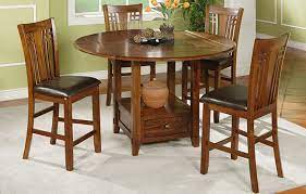 Shop round table with lazy susan from pottery barn. Zahara 42 Square To 60 Round Counter Height W Granite Lazy Susan 4 Bar Stools By Winners Only Barr S Furniture The Best Online Furniture Store