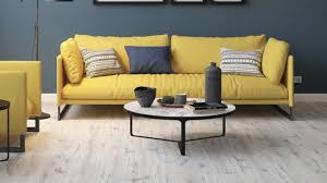 In this living room, the legs of the dining chairs may have blended too much if placed directly on the wood floors, but with a striped rug in between, they fit in and don't look out of place. Grey Washed Hardwood Floors To Suit Every Interior Wood And Beyond Blog
