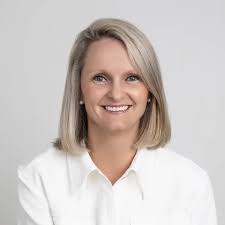 Marie Costello, Owner