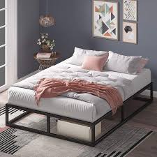 Its frame is made of wood and metal for added solidity and stability. Low Modern Platform Bed Minimalist Bedroom Furniture
