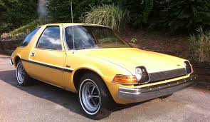 The car's unusual rounded shape with massive glass area greatly contrasted with the mostly boxy. 1975 Amc Pacer 70s Iconic Ugly Car