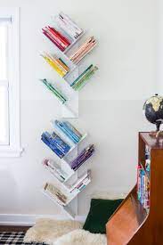 Dazzling dark wood against a white wall makes a stunning contrast. Creative Diy Bookshelf Ideas Plans Tutorials Ohmeohmy Blog