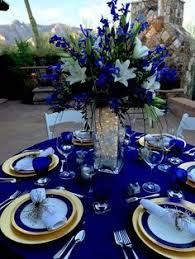 Black And Blue Wedding Colors Royal Blue Overlay Over Black Table Cloth Google Search Royal Blue Wedding Theme Blue Wedding Theme Centerpieces Blue Wedding Decorations