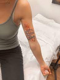 Snake And Rose Tattoo Arm Tattoos Snake Wrist Tattoos For Women Red Ink Tattoos